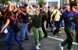 This is not a protest, yet. These anonymous individuals are part of the first San Francisco flash mob, an activity that is now apolitical, but won't be for long. Flash Mob